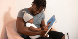 Dad and baby reading